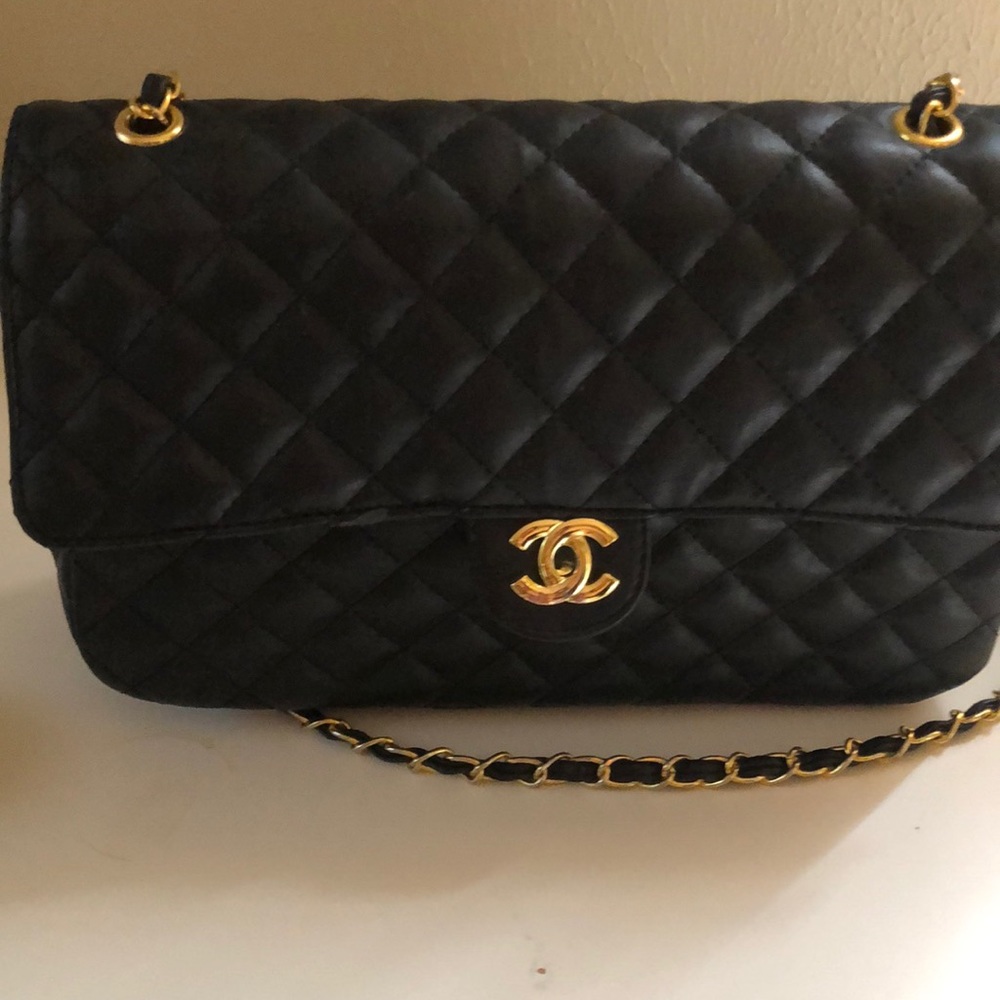 Black quilted purse, similar to designer